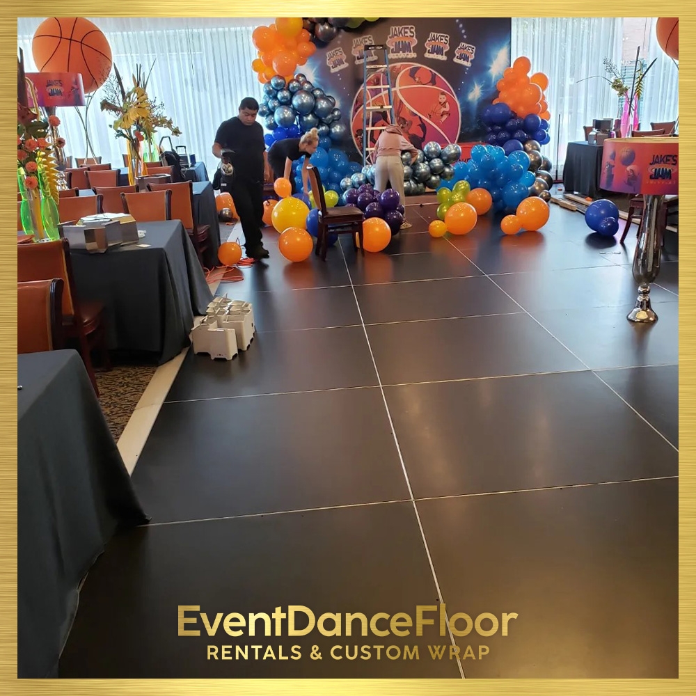 Are the ballet-themed dance floor decals easy to install and remove without damaging the floor?